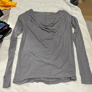 Tight basic thin gray shirt with loose neckline